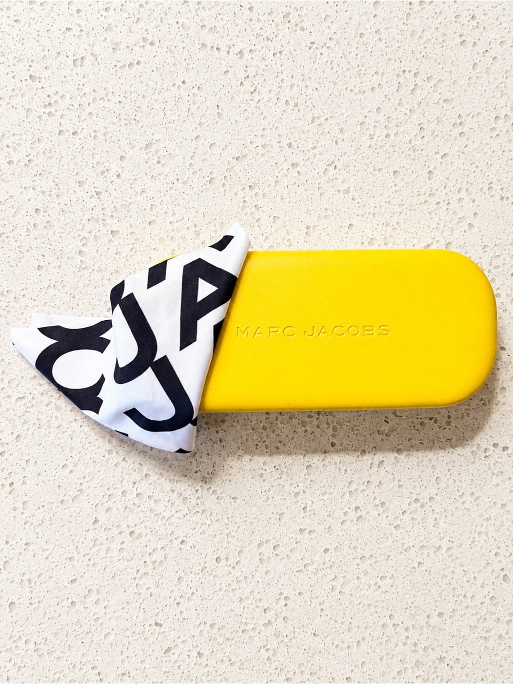 Marc Jacobs Yellow hard-shell case (no glasses)
